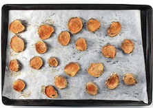 Sweet potato dog treats on a baking sheet